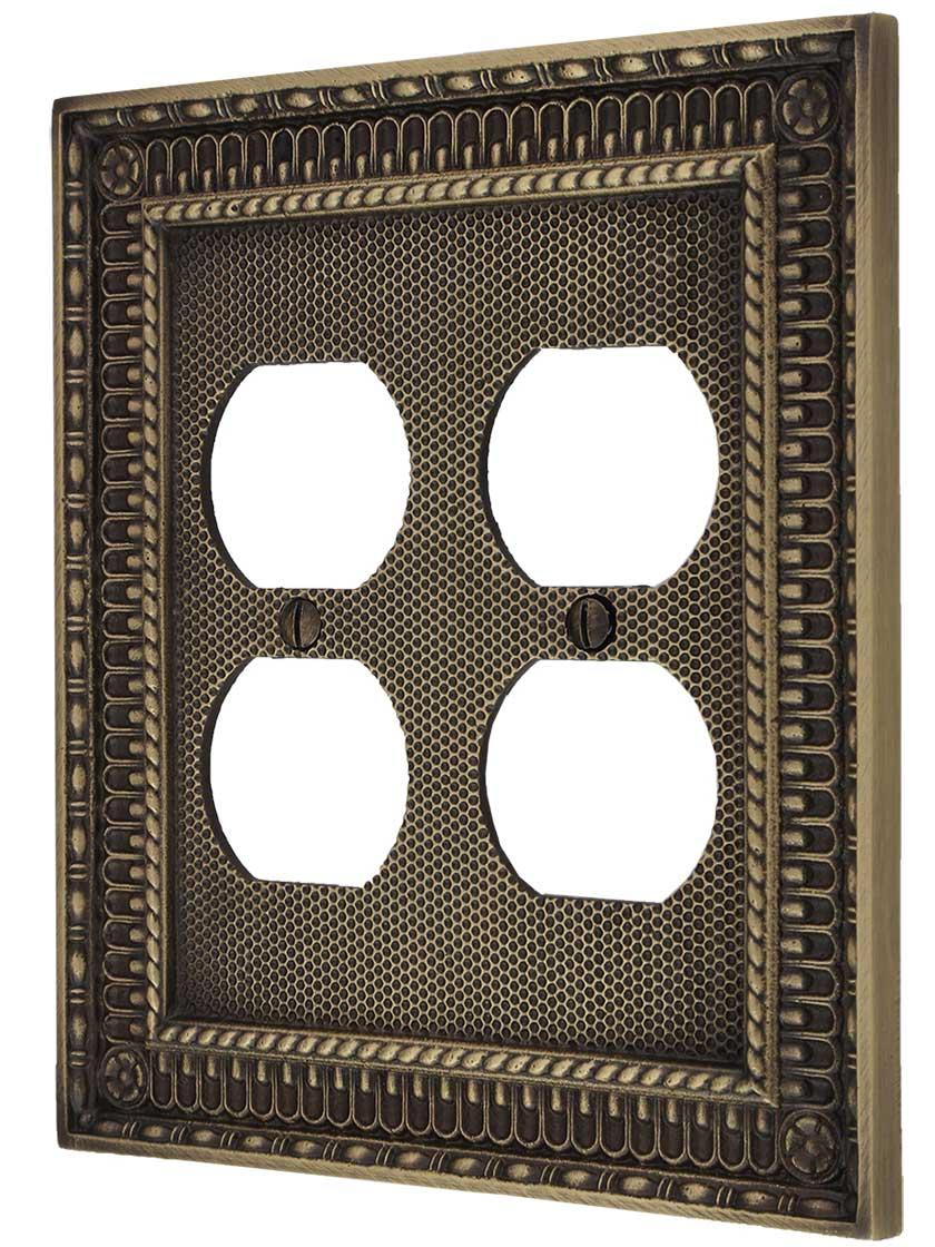 Pisano Double Gang Duplex Outlet Cover in Antique Brass.